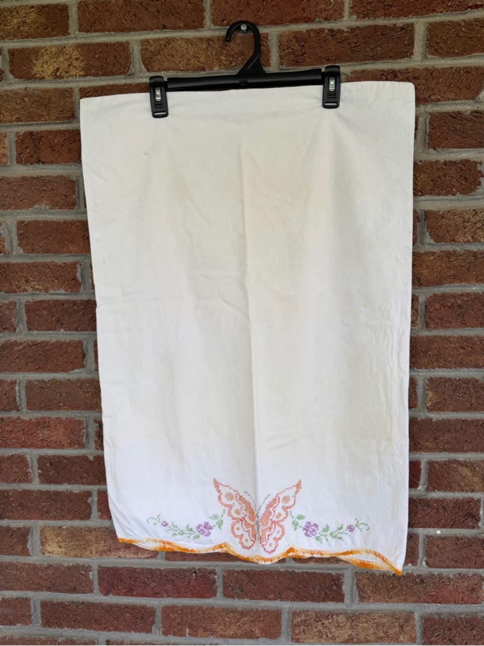 butterfly embroidered pillowcase.  set of two.  old linen. vintage.